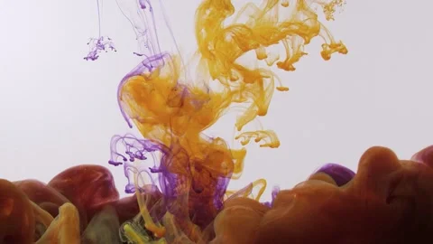 Multi colored paint splashes in the water Stock Footage 148827157