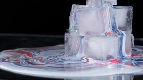 Multi-colored paint spreads over the sur... | Stock Video | Pond5