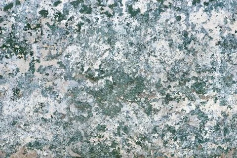 Multi colored painted stucco wall with fantastic cracks and peeling paint fla Stock Photos