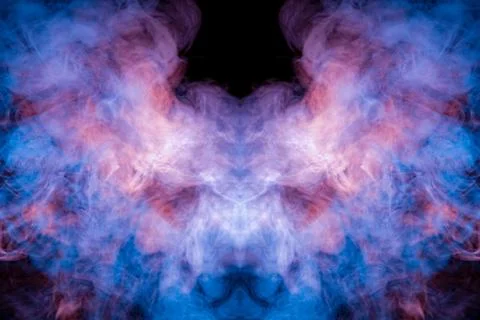 A multi-colored pattern of purple and blue smoke of a mystical shape in the f Stock Photos