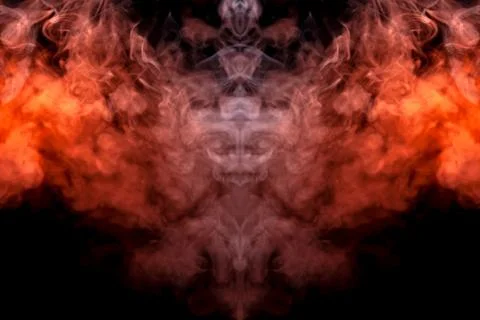 A multi-colored pattern of purple and blue smoke of a mystical shape in the f Stock Photos