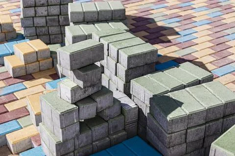 Multi-colored paving slabs. Pavement repairs and paving slabs laying Stock-Fotos