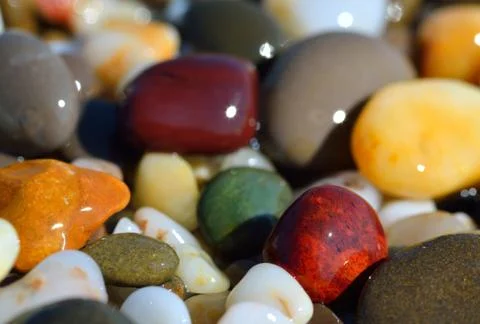 Multi-colored pebbles Stock Photos