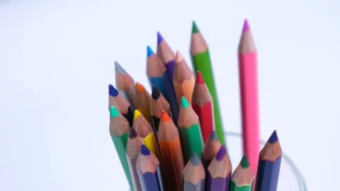 Multi-colored pencils in a jar, close-up on a white background, Stock Footage 218367643