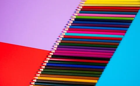 Multi-colored pencils on multi-colored background, Close up, copy space, Mode Stock Photos