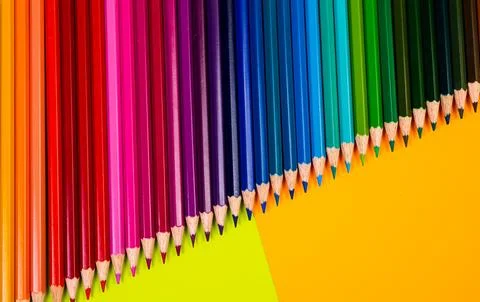 Multi-colored pencils on multi-colored background, Close up, copy space, Mode Stock Photos