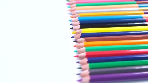 Multi-colored pencils stacked in a row close-up on a white background, Stock Footage 212653518