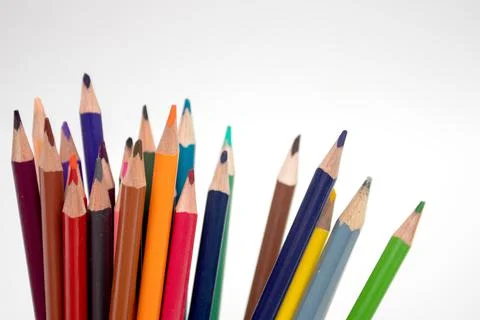 Multi-colored pencils on a white background. Stock Photos