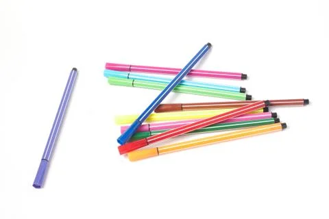 Multi-colored pens, markers on a white background isolate Stock Photos
