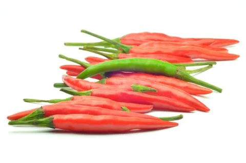 Multi-colored peppers on a white background Stock Photos