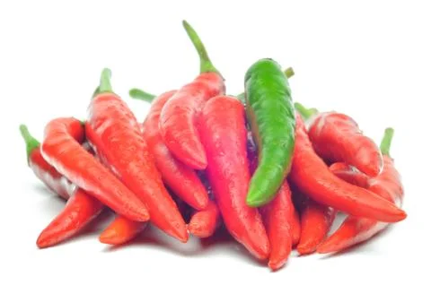 Multi-colored peppers on a white background Stock Photos