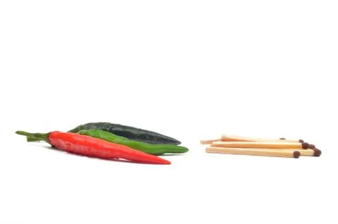 Multi-colored peppers on a white background Stock Photos