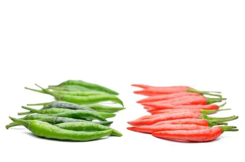 Multi-colored peppers on a white background Stock Photos