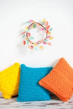 Multi-colored pillows in the interior Stock Photos