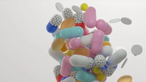 Multi-colored pills on a light background, vitamins, medicines Stock Footage 125976505