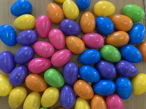 Multi-colored plastic balls. Lots of colored plastic eggs. Colorful round toy Stock Photos