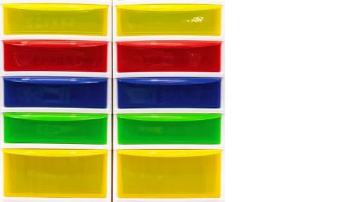 Multi-colored plastic containers. Bright storage systems for things and toys. Stock Photos