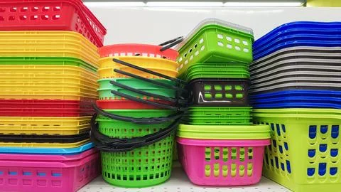 Multi-colored plastic containers of different shapes and sizes with and wit.. Stock Photos