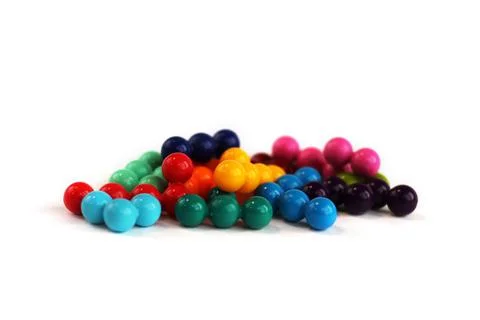 Multi-colored plastic puzzle elements in the form of balls Foto stock