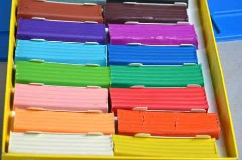 Multi-colored plasticine in a box. Stock Photos