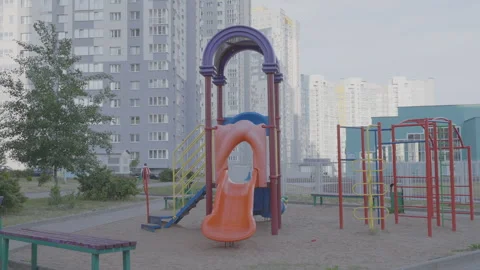 Multi-colored playground located in residential complex Video stock 244768822