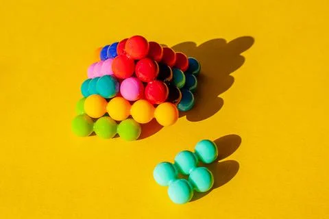 Multi-colored pyramid with one dropped element Stock Photos