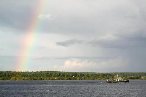 Multi-colored rainbow in the sky Stock Photos
