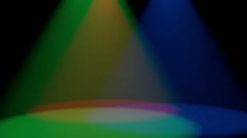 Multi-colored rays of light on a black background fall from above and circle, as Stock Footage 153163769