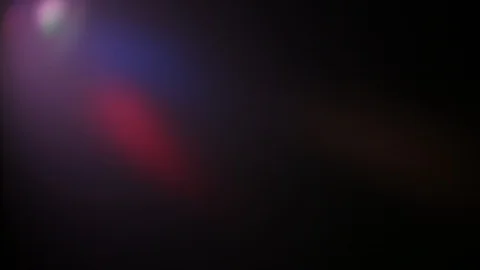 Multi-colored rays of light move randomly on a dark background Stock-Footage 109404328