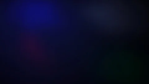 Multi-colored rays of light move randomly on a dark background Stock-Footage 109404346