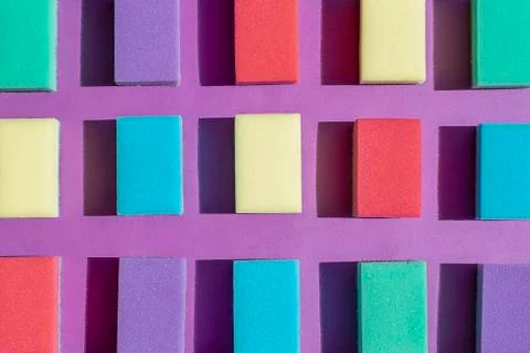 Multi-colored rectangular sponges for washing dishes. Flat lay Stock Photos