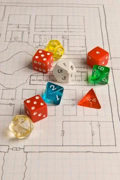 Multi-colored Role Play Dice on Hand Drawn Game Map Stock Photos
