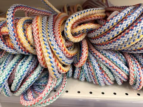 Multi-colored rope twisted into a ball Stock Photos