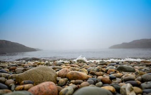 Multi-colored round rocks on Little Hunters Beach in Acadia National Park, Maine Foto stock