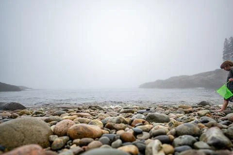 Multi-colored round rocks on Little Hunters Beach in Acadia National Park, Maine Stock Photos