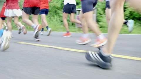 Multi-colored running shoes motion Stock Footage 341738756
