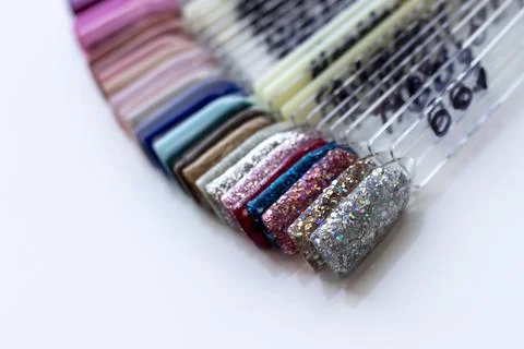 Multi-colored samples of nail tips for nail design. Manicure nail polish samples Stock Photos