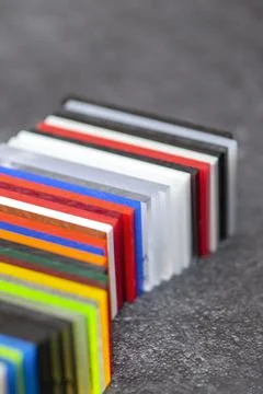 Multi-colored samples of organic glass. Colorful acrylic sheets plastic swatches Stock Photos
