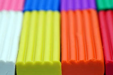 Multi-colored set of plasticine sticks closeup view. Bright polymer plastic Stock-Fotos