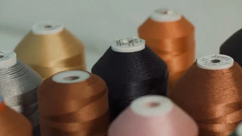 Multi-colored sewing reels Stock Footage 99815479