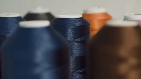Multi-colored sewing reels Stock Footage 99815480