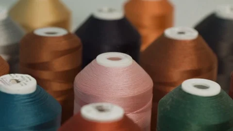 Multi-colored sewing reels Stock Footage 99815484
