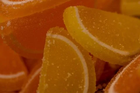 Multi-colored shaped marmalade lemon slices, close-up, selective focus. Stock Photos