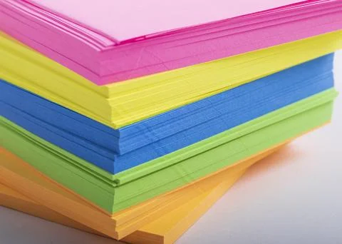 Multi-colored sheets for records in the office. shadow, close-up. the backgro Stock Photos