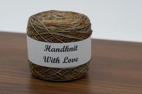 Multi colored skein of yarn with the message of Handmade With Love Stock Photos