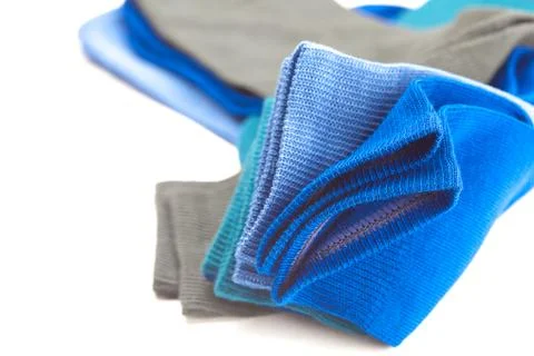 Multi colored socks made of cotton isolated on white Foto stock
