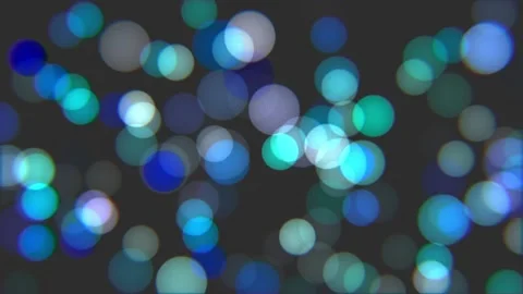 Multi-colored spheres move slowly on a black background. Stock Footage 145274221
