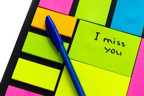 Multi-colored stickers for notes of different sizes and shapes with a marker. Stock Photos