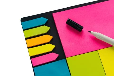 Multi-colored stickers for notes of different sizes and shapes with a marker. Stock-Fotos