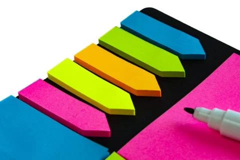 Multi-colored stickers for notes of different sizes and shapes with a marker. Stock Photos